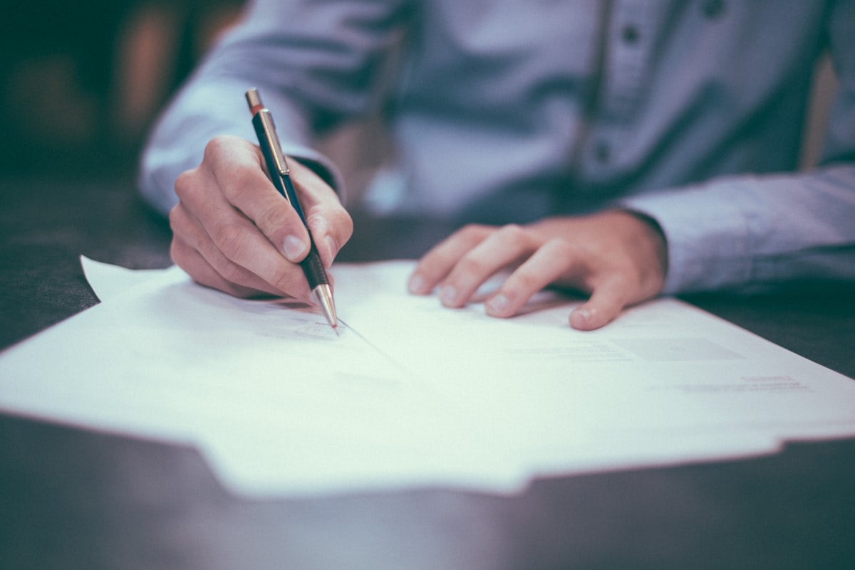 Signing and reviewing business documents and invoices